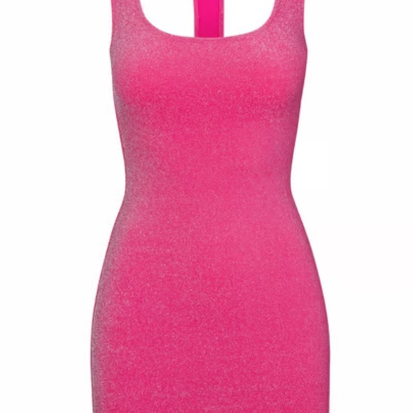 skims pink glitter dress Get ready with @hal pal in the Soft Lounge Shimmer Slip Dress. #SKIMS